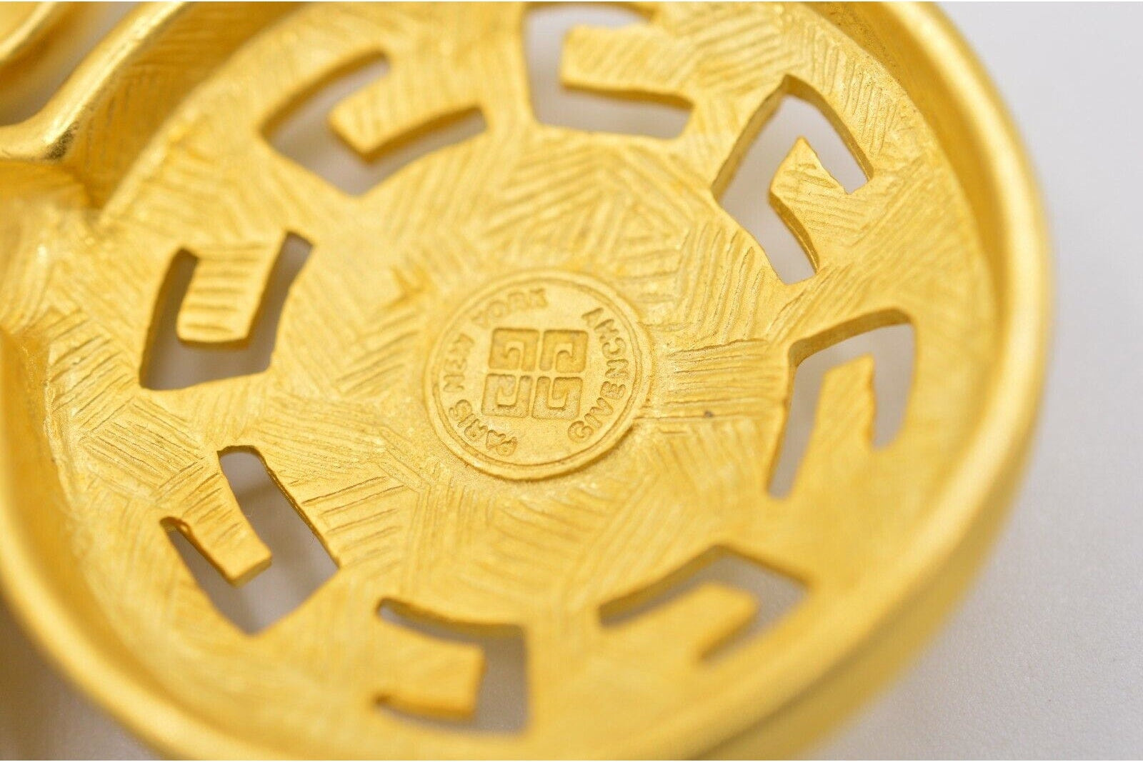 Closeup view of the Givenchy 4G hallmark 