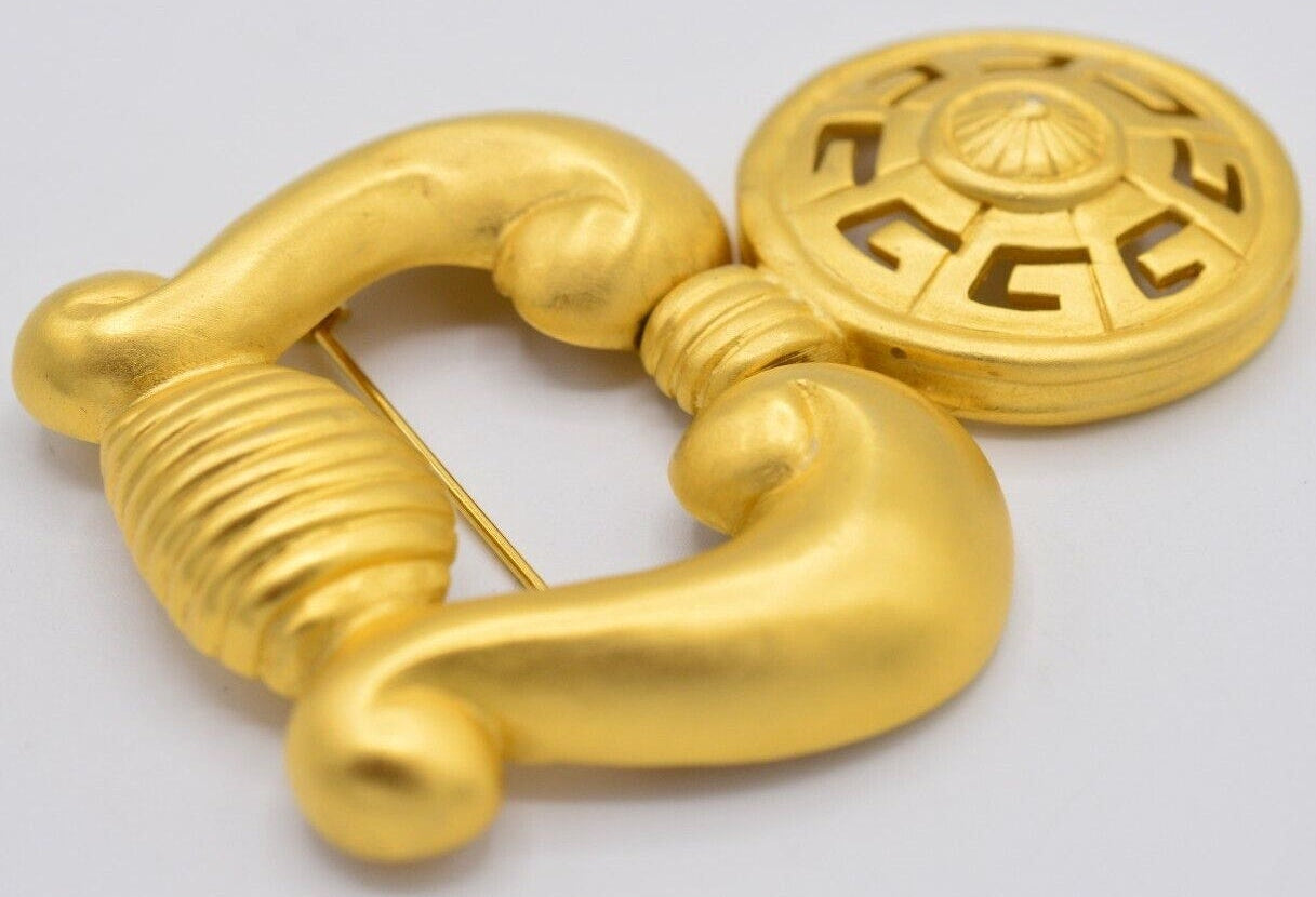 Alternate view of a vintage Givenchy door knocker brooch on a white background